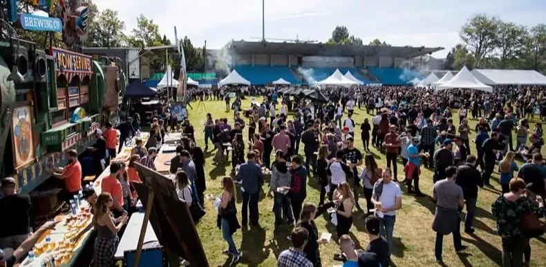 Beer and cider festival in BC with outdoor tents and crowds