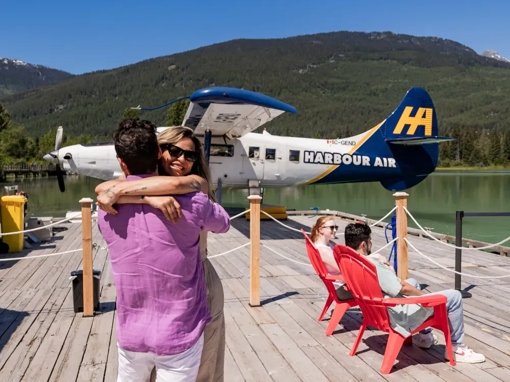 Couple on the dock hugging in Whistler1.webp
