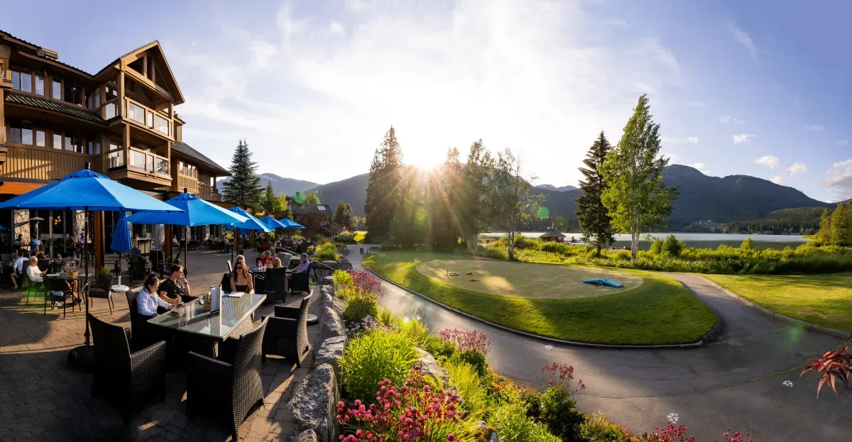 Table Nineteen restaurant patio overlooking Green Lake  and the Harbour Air seaplane terminal in Whistler BC